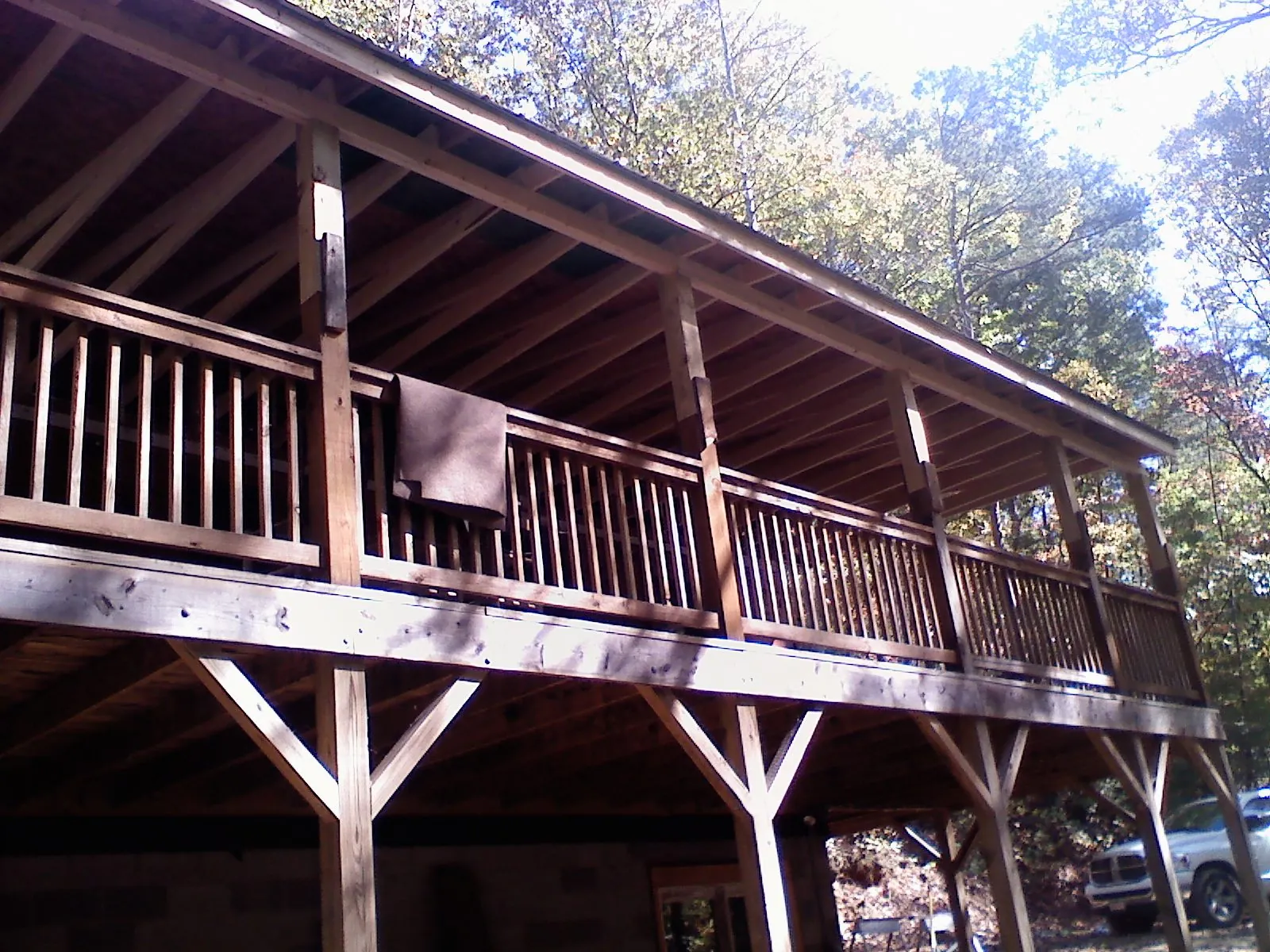 Timber framing under a new elevated porch and deck — Roof Leak Repair in Philipsburg by Roofing Brothers